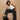petite women posing on stool in trousers